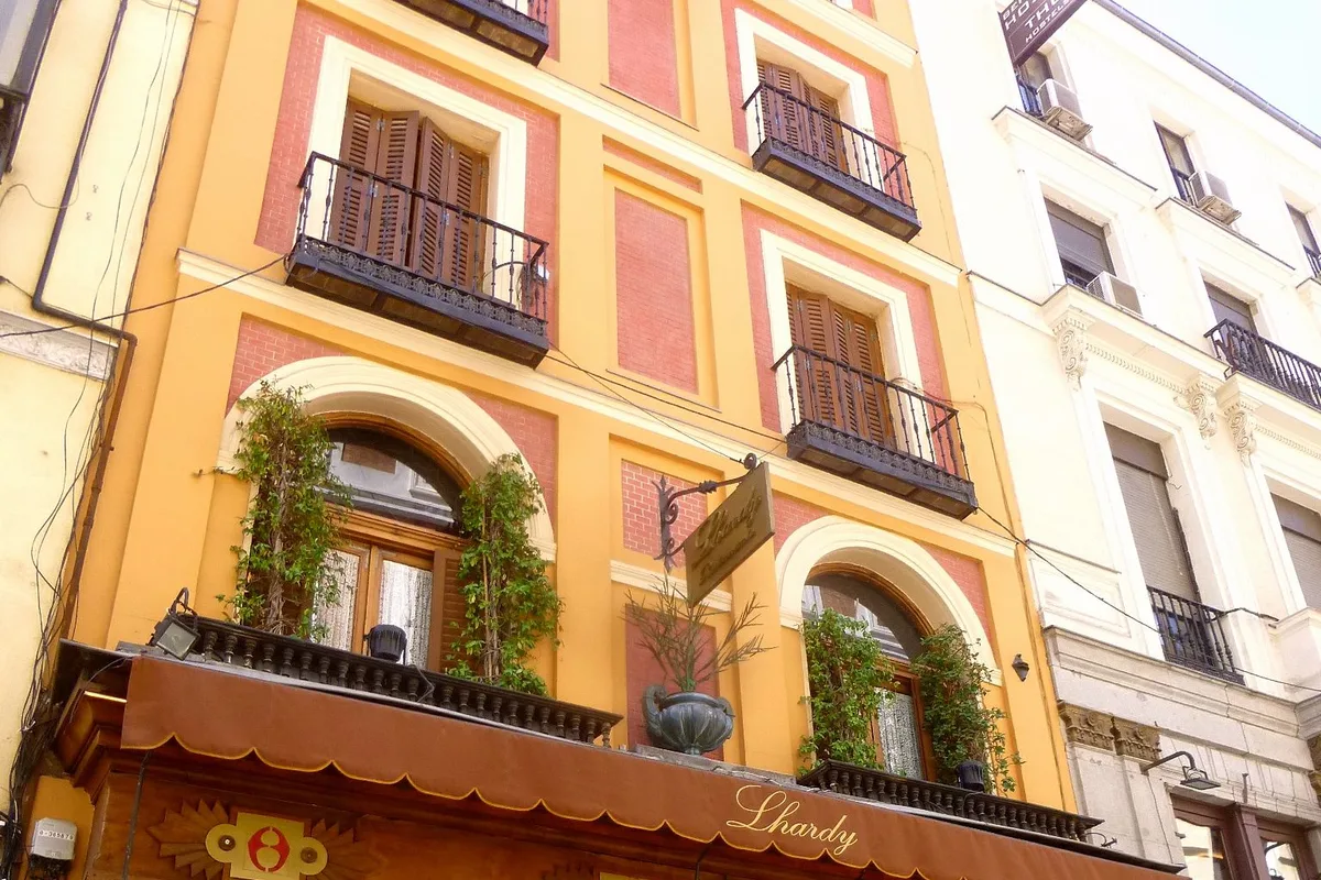 The ornate historic facade of Lhardy restaurant on Carrera de San Jerónimo, Madrid