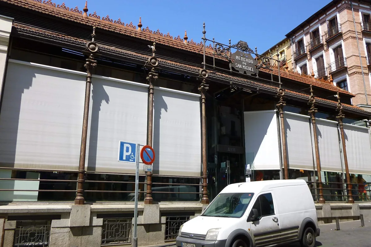 The wrought-iron and glass exterior of Mercado de San Miguel in central Madrid