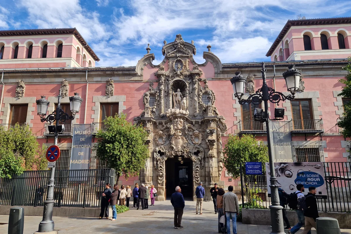 The ornate Baroque portal entrance of the Museo de Historia de Madrid